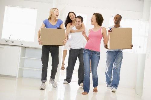 Boxes and packing supplies ready for a move in Acton