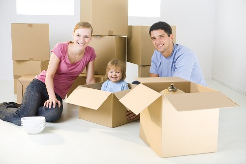 Local removal team handling a home move with furniture and boxes