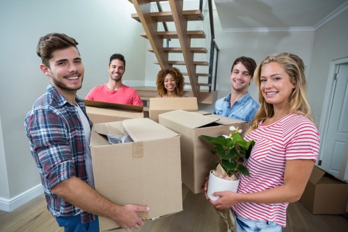 Local removals team preparing furniture and boxes for a home move