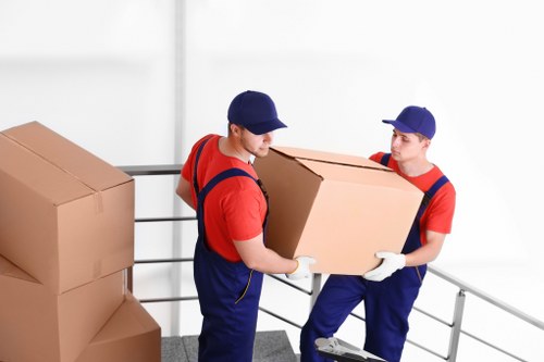Movers preparing a transparent quote for an Acton apartment move