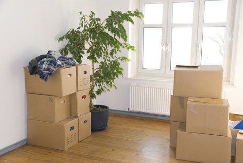 Local moving team handling a flat with narrow access
