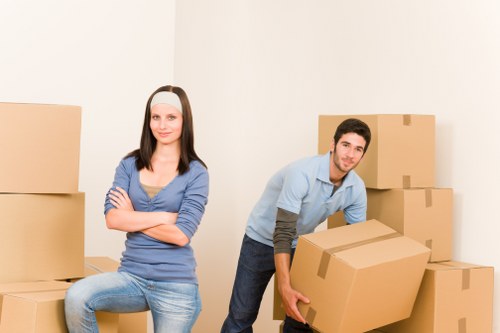 Packed boxes and furniture ready for a flat removals service