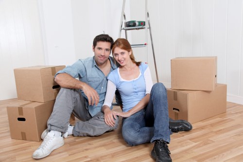 Packed office boxes and equipment prepared for secure transport during a business relocation