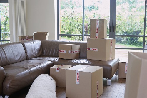Movers handling narrow access and stairs during a local furniture move